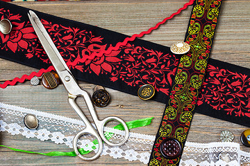Image showing vintage scissors, ribbons and old buttons