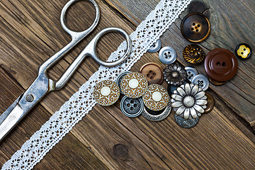 Image showing vintage buttons, lace, and a dressmaker scissors