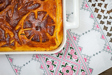 Image showing Kulebyaka. cabbage pie on the embroidered cloth