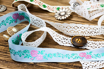 Image showing ribbon, lace, ribbons and buttons