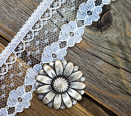 Image showing vintage button and lace tape