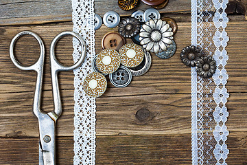 Image showing antique lace, buttons and a tailor scissors