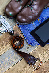 Image showing traveler set with a leather belt, digitizer, camera, jeans and b