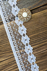 Image showing vintage button and lace tape