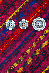 Image showing vintage tape with embroidered ornaments and old buttons