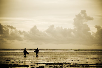 Image showing Surfers on the beach