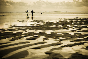 Image showing Surfers at the beach