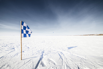 Image showing Flags on the background of winter sky
