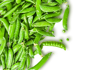 Image showing The scattered pods of green peas