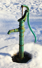 Image showing Water pump in the garden at winter 