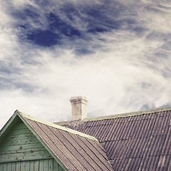 Image showing old house with a tiled roof and chimney
