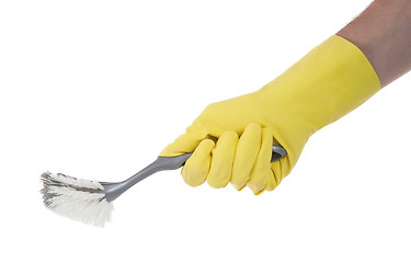 Image showing Protection glove holding a dish-brush