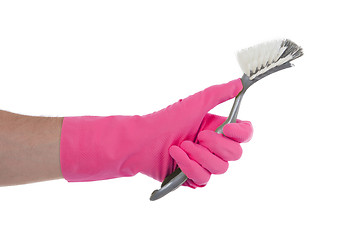 Image showing Protection glove holding a dish-brush