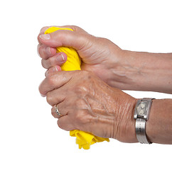 Image showing Old woman cleaning