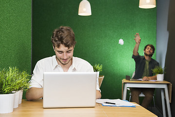 Image showing Student Using Laptop In Stylish Lobby