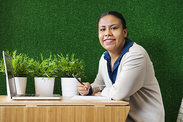 Image showing Smiling Businesswoman In Office Lobby