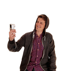 Image showing Man in hoody taking selfie.