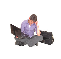 Image showing Thinking with his laptop.