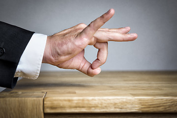 Image showing Man shoots with finger