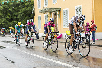 Image showing Group of Cyclists Riding in the Rain - Tour de France 2014