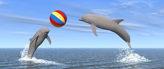 Image showing dolphins palying with ball