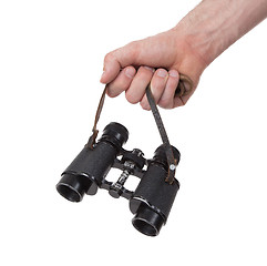 Image showing Vintage binocular in mans hand