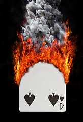 Image showing Playing card with fire and smoke