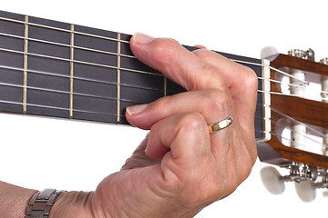 Image showing Old hand and guitar isolated