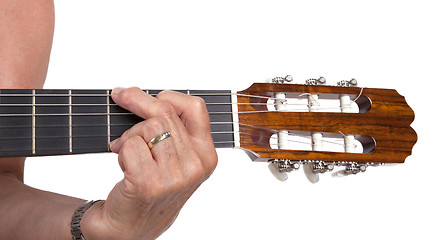 Image showing Old hand and guitar isolated