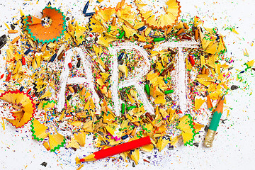 Image showing art word on the background of colored pencil shavings