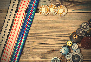 Image showing vintage buttons and ancient ribbons