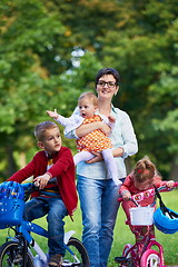 Image showing modern mother portrait  with kids in park