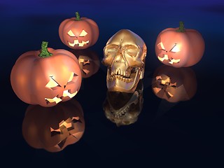 Image showing pumpkins and golden skull
