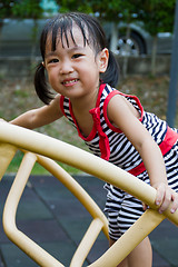 Image showing Asian Kid Climbing