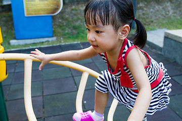 Image showing Asian Kid Climbing