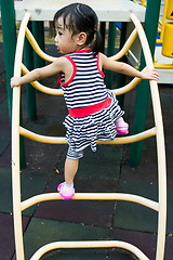 Image showing Asian Kid Climbing