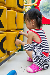 Image showing Asian Kid playing on Playground