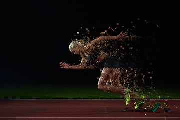 Image showing pixelated design of woman  sprinter leaving starting blocks