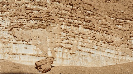 Image showing Texture of an orange weathered rock in the desert