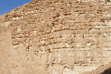 Image showing Texture of an orange weathered rock in the desert