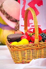 Image showing The beautiful basket with vegetables, fruit is on sale at fair.