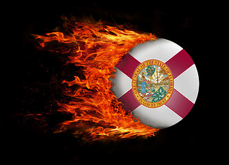 Image showing US state flag with a trail of fire - Florida