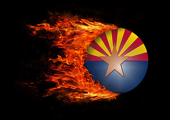 Image showing US state flag with a trail of fire - Arizona