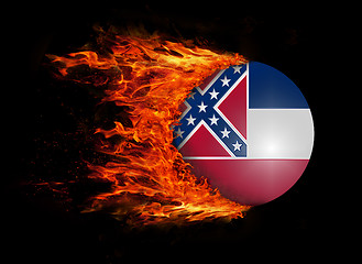 Image showing US state flag with a trail of fire - Mississippi