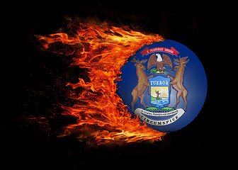 Image showing US state flag with a trail of fire - Michigan