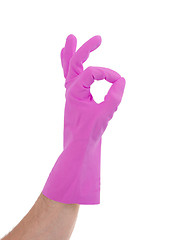 Image showing Hand gesturing with pink cleaning product glove