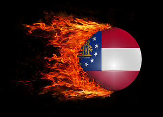 Image showing US state flag with a trail of fire - Georgia