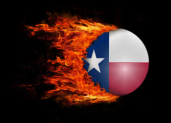 Image showing US state flag with a trail of fire - Texas