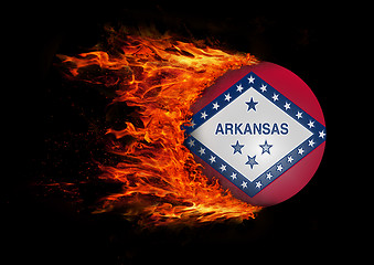 Image showing US state flag with a trail of fire - Arkansas