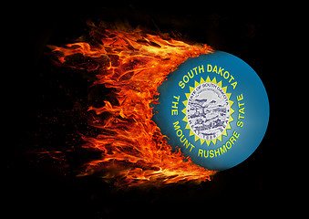 Image showing US state flag with a trail of fire - South Dakota